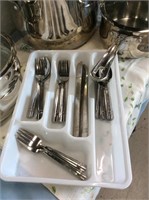 Service for four utensils in tray