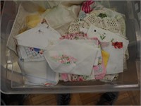 Container of vintage women's hankies and more
