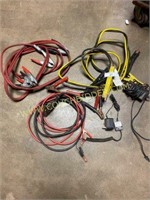 Assorted jumper cables & a battery charger