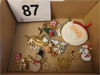 Box of pins - snowmen, poodles, butterflies