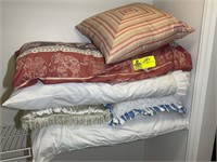 Group of pillows in master closet