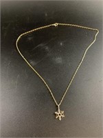 14kt Gold necklace with a solid gold snowflake pen