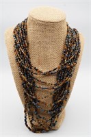 Multi Strand Beads with Wooden Clasp