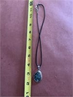 Charm necklace with decorative stone