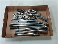 assortment of sockets, ratchets, extensions