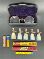 Antique pencil sharpeners, lead, and eyeglasses