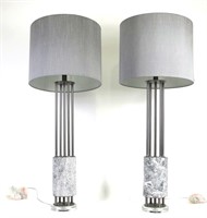 PAIR OF CONTEMPORARY METAL COLUMN ON MARBLE BASES