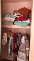 Content of closet, comforters and blankets plus