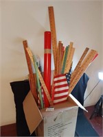 Box Of Yard Sticks and USA Flags