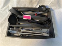 Black tray and assorted utensils