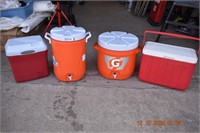 Two Orange Drink Dispensers & Two Ice Chests