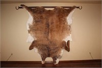 Cow Hide Mounted on Metal Bar with