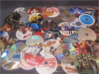 About 100 Scratched Movie Discs (No Cases)