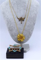 Three various costume jewellery items