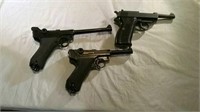 4 War era commemorative pistols
