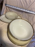 Group lot of vintage fire king bowls and plates.