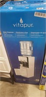 Vitapur water dispenser new but dented on side