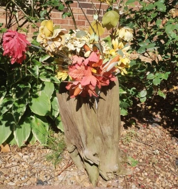 Unique piece of wood with a flower pot