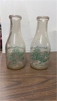 2 Elm point dairy bottles