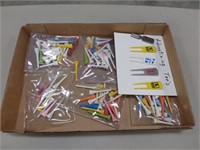 assortment of golf tees