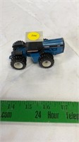 ERTL ford 846 tractor 1/64 scale.