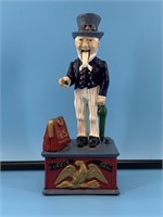 Mechanical cast iron Uncle Sam Bank, 11" tall