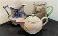 Lot of three decorative pitchers - one in a