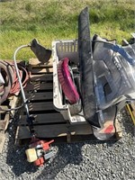 Weedwhacker, dog kennel, motorcycle fender,