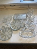 Clear glass cups, trays, pitcher