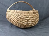 Primative Buttocks Basket with Glass Eggs