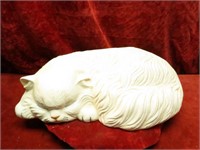 Ceramic cat figure.