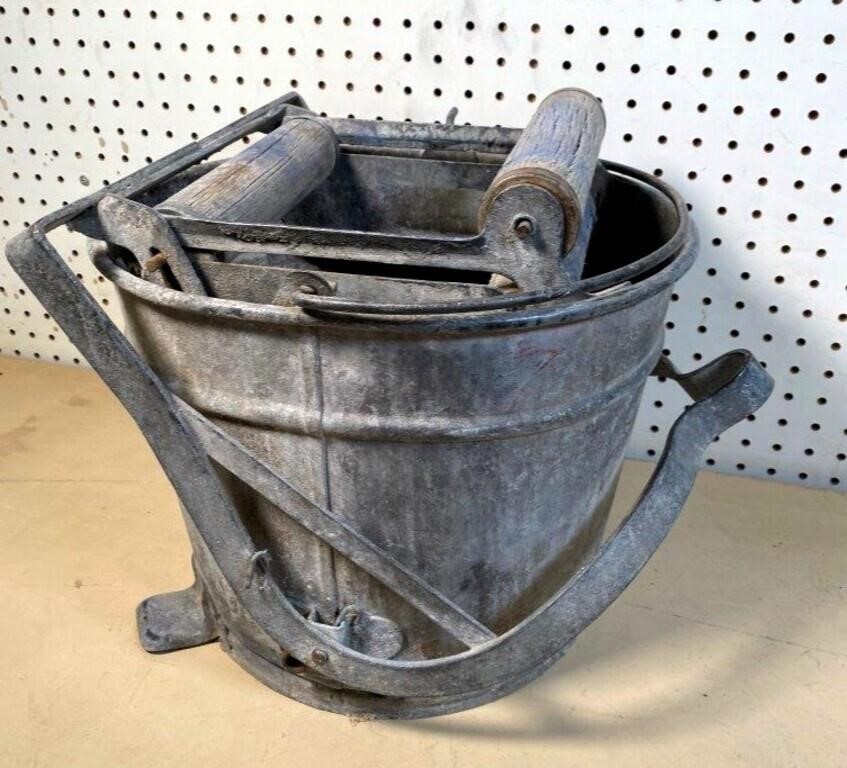 antique mop bucket