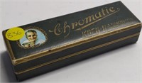 Chromatic Koch Harmonica in Case