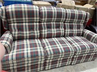 TAN SOFA WITH BLUE AND GREEN PATTERN