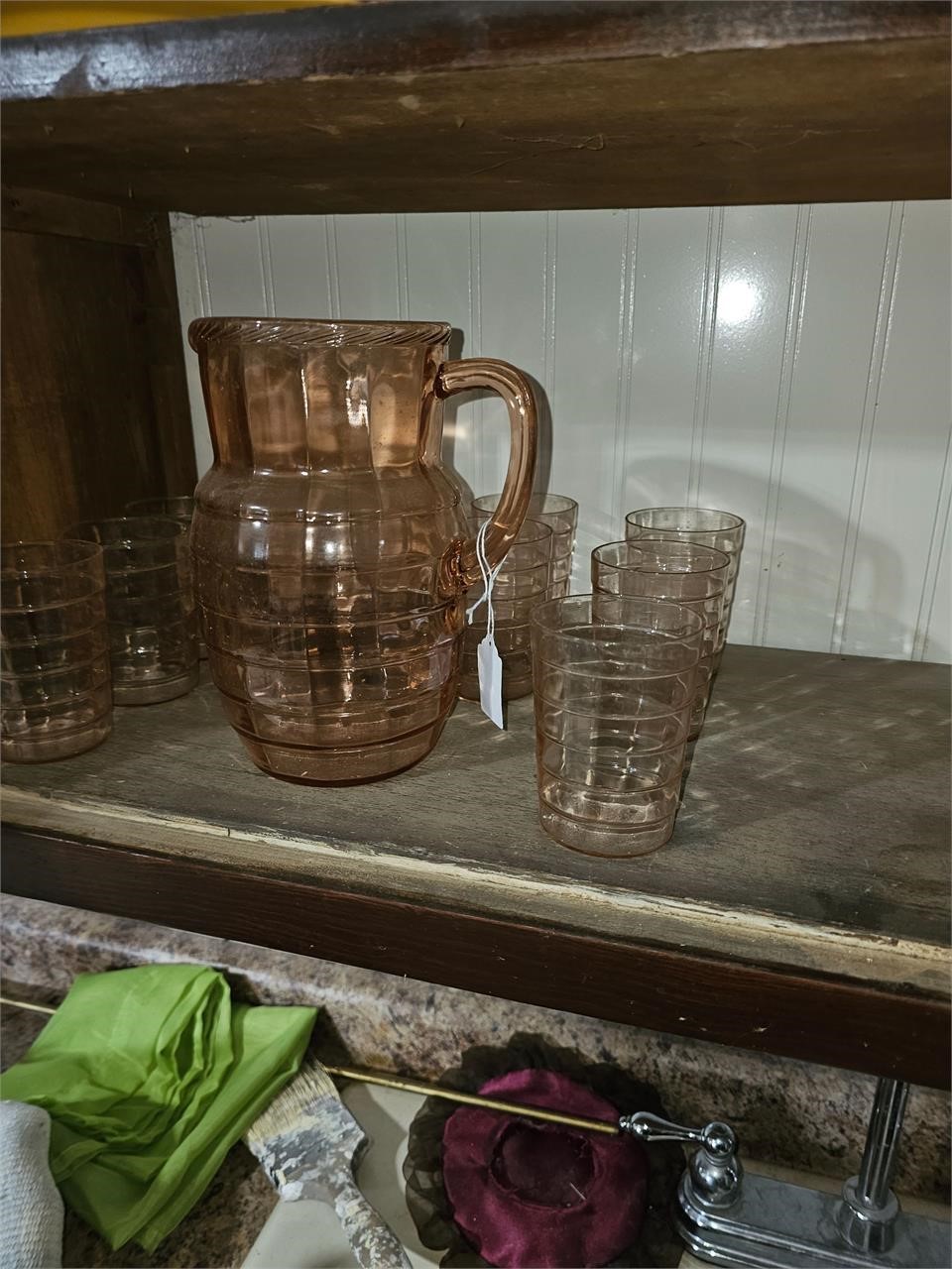 Pink depression glass pitcher and 10 cup set
