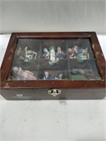 Wooden box with tiny  figurines