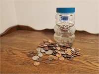 Skippy peanut butter jar bank, coins included
