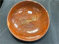 19th C. redware slip decorated plate.