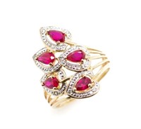Created ruby and two tone 9ct gold "leaf" ring