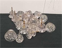 18 large and one small glass drawer pulls or