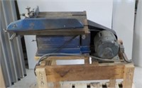 Craftsman table saw with electric motor.
