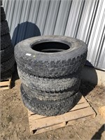 Four 11R22.5 semi tires