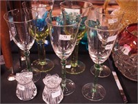 Six contemporary wine goblets with green