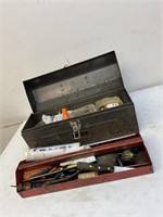 Gray metal toolbox and contents