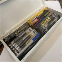 14.5" x 6" box filled with pens and pen refills