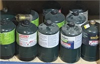 Coleman propane camping bottles, a few are  full