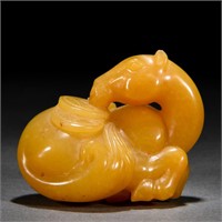 A Chinese Carved Yellow Jade Horse