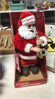 Cocacola a santa playing saxophone