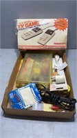 Box of miscellaneous electrical stuff with TV