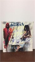 Zebra the Band hand signed cardboard